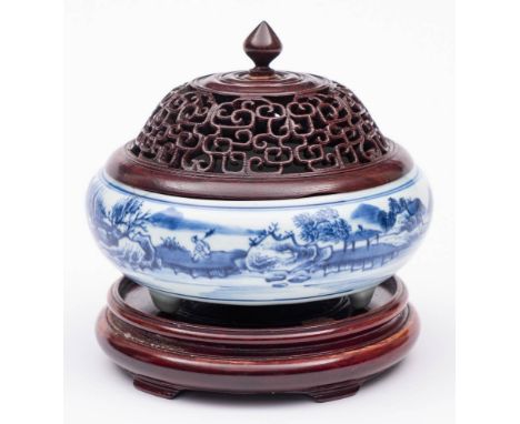 A Chinese blue and white tripod censer: of compressed globular form, painted with buildings, figures and a sanpan in a contin