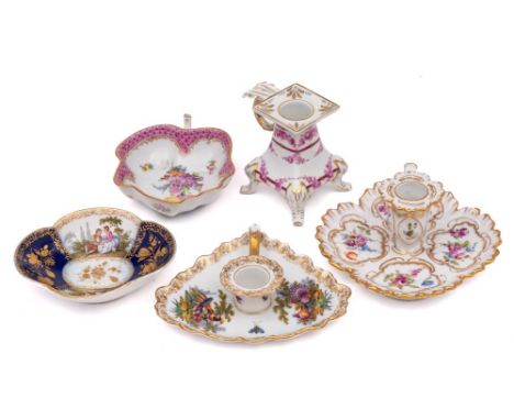 A small group of Continental porcelain: comprising a K.P.M. Berlin chamber stick, two Dresden chamber sticks, a leaf shaped d