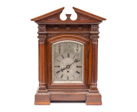 A Victorian oak chiming bracket clock: the eight-day duration, triple-fusee movement striking the hours on a gong and the qua