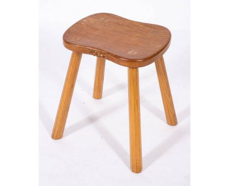 Workshop of Robert 'Mouseman' Thompson (Kilburn), an English oak 'milking stool',: the kidney shaped seat with a trademark ca