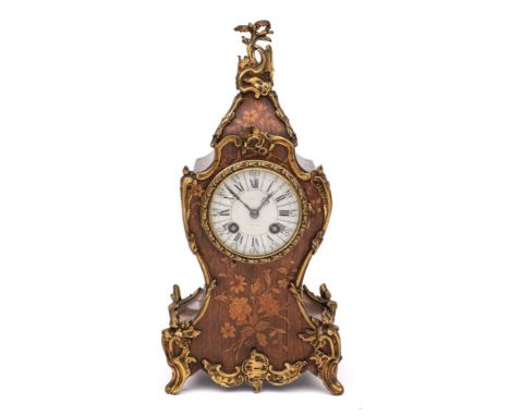 A Victorian French inlaid rosewood mantel clock: the eight-day duration movement striking the hours and half-hours on a gong,