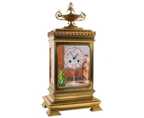 A French gilt-brass and porcelain panelled mantel clock: the eight-day duration movement striking the hours and half-hours on