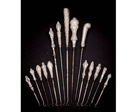 A collection of fifteen assorted silver-handled button hooks, various makers and dates: with steel shaft and hook, various si