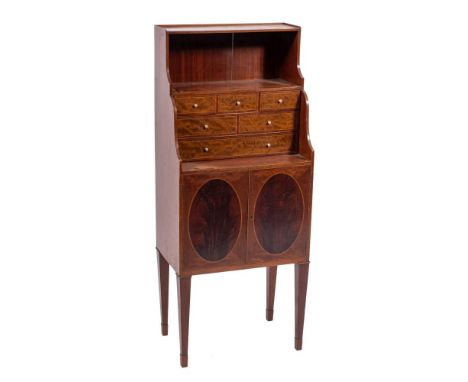 An Edwardian mahogany side cabinet in the manner of a cheveret, early 20th century,: the superstructure 'waterfall' front wit