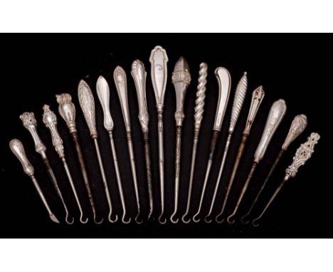 A collection of fifteen assorted small silver-handled button hooks, various makers and dates: with steel shaft and hook, vari