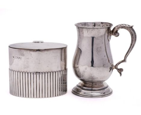 An Edward VII silver mug, maker's mark worn, Birmingham, 1904: of baluster form, with acanthus capped scroll handle on a spre