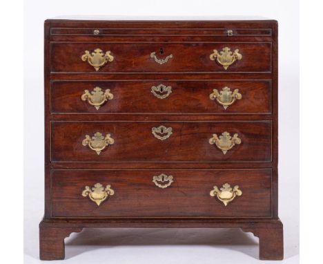 A George III mahogany bachelor's chest of drawers, circa 1770,: with caddy top above a brushing slide, above four graduated d