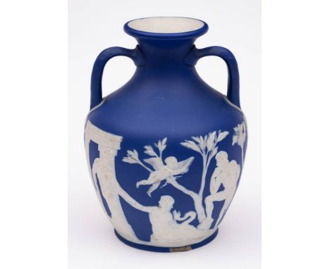 A Wedgwood blue and white jasper ware 'Portland' vase: decorated in low relief with the myth of Pelius and Thetis, the unders