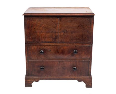 A George III mahogany bedroom commode chest, last quarter 18th century,: the hinged top with ogee moulded front and side edge