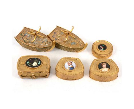 Pair of French champlevé enamel and gilt metal novelty boxes, each designed as the prow of a ship, and with an anchor handle,