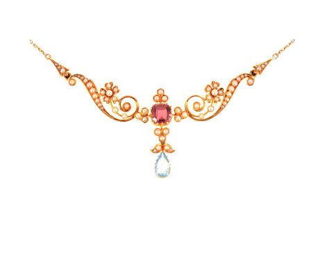 An Edwardian necklace set with pink tourmaline, aquamarine and seed pearls, the central 7mm square cut tourmaline set in a ye