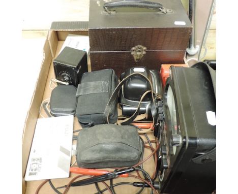 A microscope, cased, together with an avometer and vintage cameras