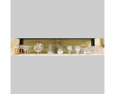 A shelf of cut and coloured glassware, to include tumblers