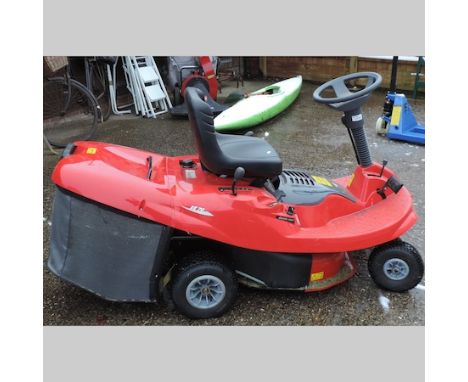 A red Parcel ride on petrol lawn mower, with a Briggs & Stratton engine