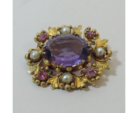 A Victorian amethyst and seed pearl brooch, cased