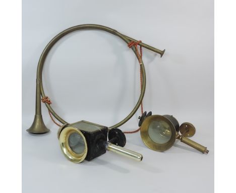A coaching lamp, together with another and a hunting horn