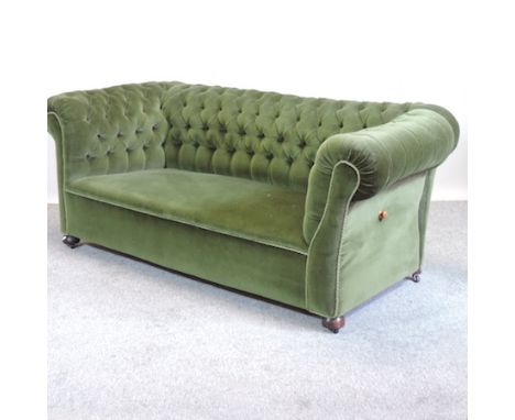 A 1920's green upholstered button back drop end chesterfield sofa, 193cm