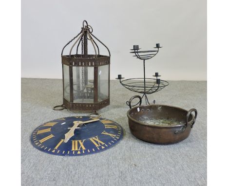 A painted wall clock, 45cm diameter, together with a Victorian copper jam pan, hanging lantern and an iron candlestick