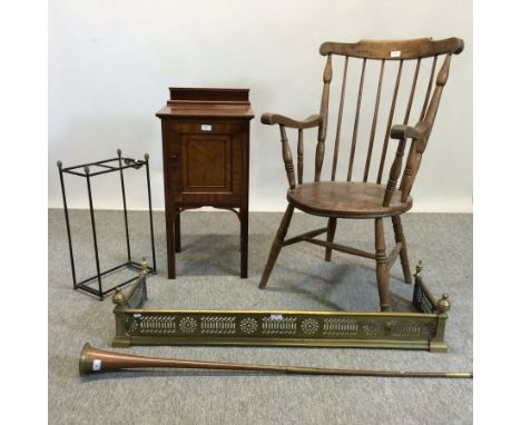 An Edwardian mahogany pot cupboard, 40cm, together with a spindle back armchair, brass fender, a metal stick stand and huntin