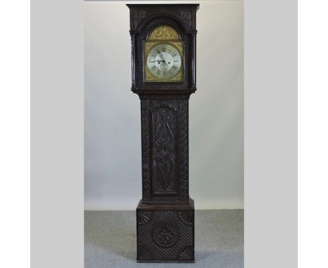 An 18th century carved oak cased longcase clock, with a brass dial inscribed Richard Drury, Charlecote, having an eight day m