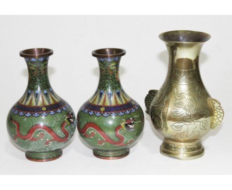 A pair of cloisonne vases height15.5cm and an archaic style bronze vase height 18cm.&nbsp;Condition - one of the cloisonne va