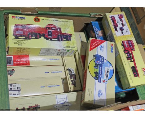 A box containing sixteen boxed Corgi model vehicles.  
