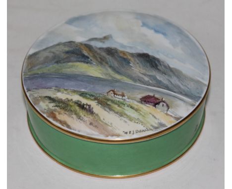 A Royal Crown Derby porcelain casket of cylindrical form and hand painted with a mountain scene, signed 'WJ Dean', diam. 12.5