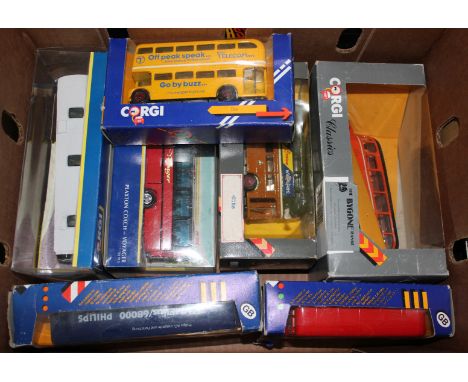 A box of seven boxed model buses by Corgi.  