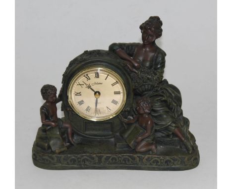 A Juliana Quartz figural mantle clock, length 24cm.  