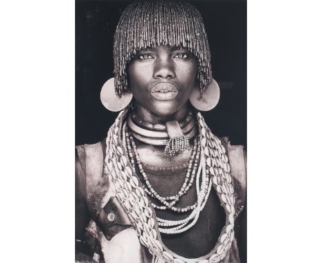 John Kenny, b. 1975, C-type print. ' Ethiopia- Ormo Black &amp; White' Depicting a woman in traditional attire, 67cm x 45cm