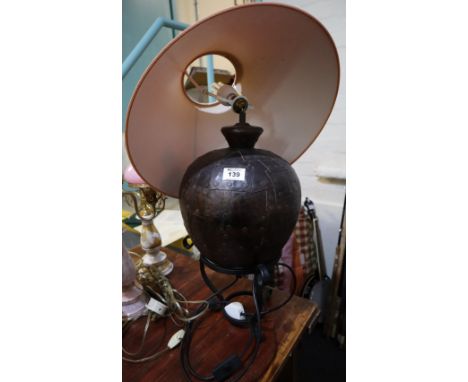 Globular ceramic table lamp with shade on wrought metal base. (B.P. 24% incl. VAT)