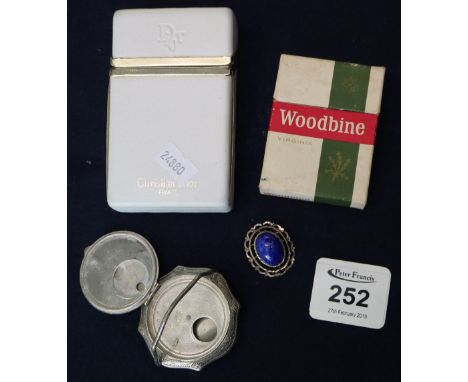 Christian Dior cigarette case, silver plated compact and a brooch.(B.P. 24% incl. VAT)