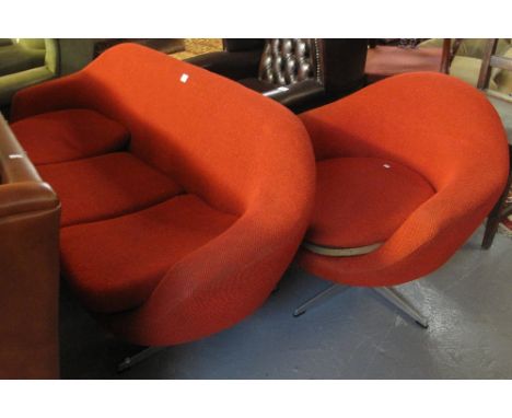 Retro 1960's upholstered two piece suite to include; three seater sofa and a bucket shaped revolving chair on chrome base. (2