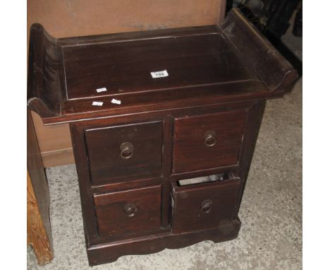 Oriental style hardwood altar type side table having four square drawers on bracket feet. Water damaged, no reserve.(B.P. 24%