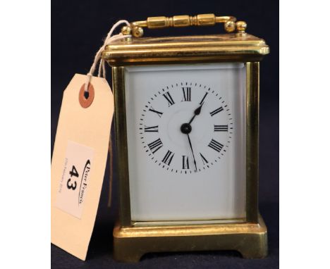 French lacquered brass carriage clock with full depth Roman dial and key. 10.5cm high approx. (B.P. 24% incl. VAT) CONDITION 
