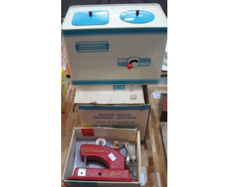 Vintage Chad Valley hoovermatic toy washing machine in original box, together with a miniature Vulcan child's sewing machine.