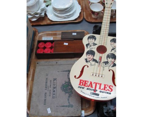 Vintage The Beatles plastic new sound guitar, together with Kid Kord record album 33 nursery rhymes and a set of dominoes and