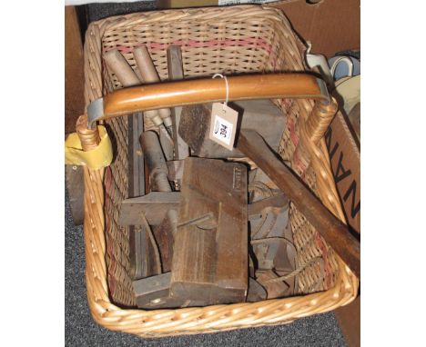 Wicker basket comprising various vintage wooden tools, mallets, planes etcs. (B.P. 24% incl. VAT)