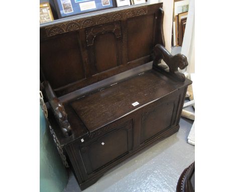 Reproduction oak monk's bench. (B.P. 24% incl. VAT)