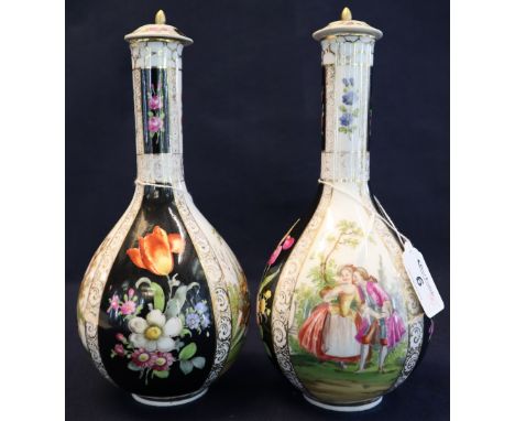 Pair of Dresden porcelain bottle vases and covers with printed and painted decoration. Crown mark to bases, 24cm high approx.