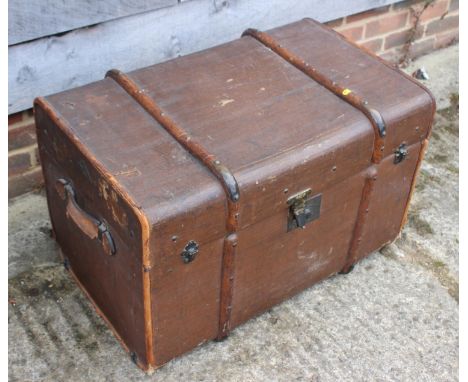 A late 19th century canvas and maple bound travel trunk with fitted interior and lift-out tray