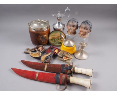 A Meerschaum pipe, formed as a hawk's claw, two other similar pipes, in cases, an oak and silver plate mounted biscuit barrel