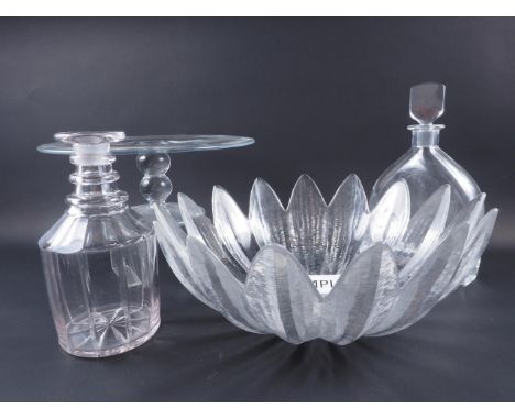 A clear glass Orrefors decanter and stopper, an opaline glass table lamp, 9 1/2" high, a contemporary flower shaped bowl, 14"