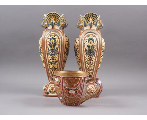 A pair of Zsolnay vases with reticulated decoration, 11 1/2" high, and an overlaid and gilded mug (handle stapled)Condition: 