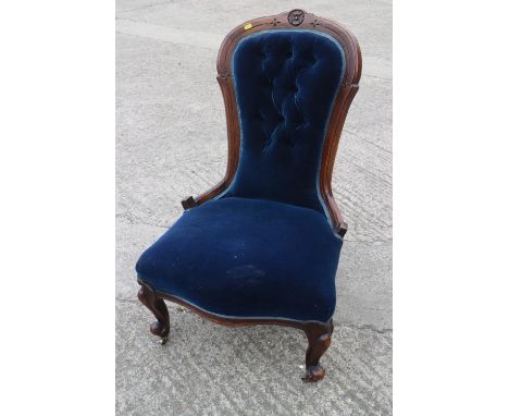 A 19th century mahogany showframe chair, button upholstered in a blue velour, on cabriole supports&nbsp;with two late 19th ce
