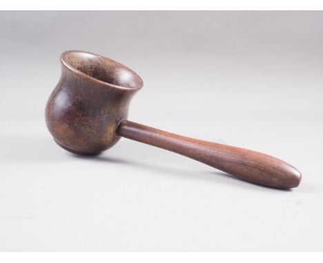 A 19th century turned rosewood "Ladle" inscribed, "Presented to Pride of Poona Lodge 7424 by Bro E R Devlon", 12" long 