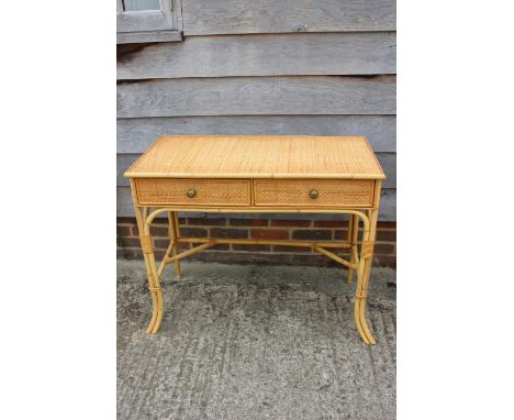 A bamboo and rattan dressing table, fitted two drawers, 37" wide and a white painted wicker side chairCondition:Some small bl