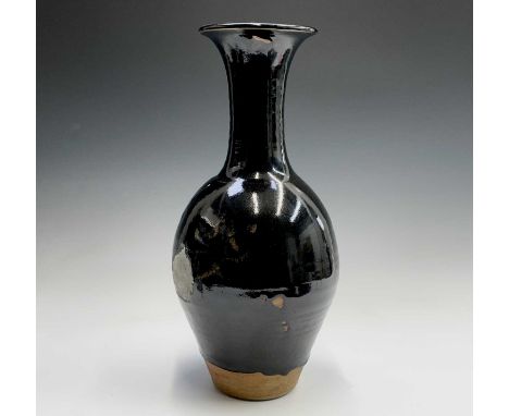 Bernard LEACH (1887-1979)A large tenmoku glazed vase Impressed personal and Leach Pottery, St Ives seals Height 47cmCondition
