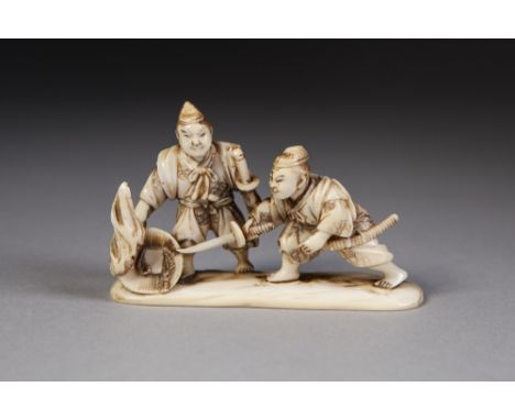 A FINE 19TH CENTURY JAPANESE CARVED IVORY ONE PIECE OKIMONO STYLE NETSUKE in the form of Benkei and Yoshitsune, the flat base