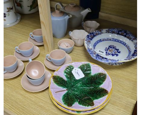A pair of George Jones majolica leaf-patterned plates and sundry ceramics, including a quantity of Poole Pottery two-tone tea